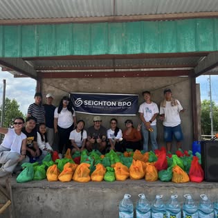 The Seighton team with relief goods for the Sama-sama para sa San Jose donation drive